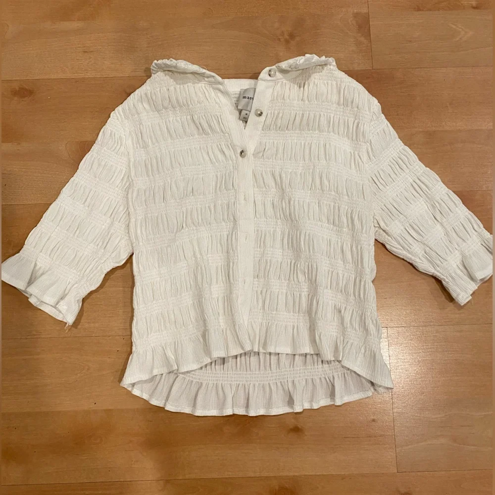 Ivory Smocked Button Front Top - Picture 1 of 4